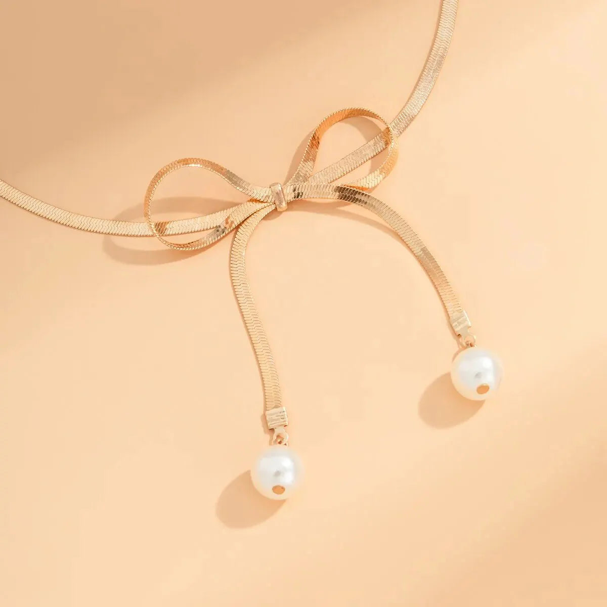 Dainty Herringbone Pearl Bow Necklace - Veinci